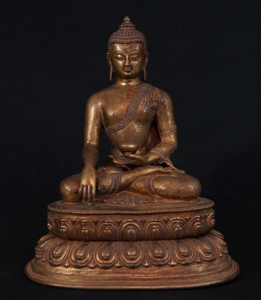Old Nepali Buddha statue from Nepal, made from bronze